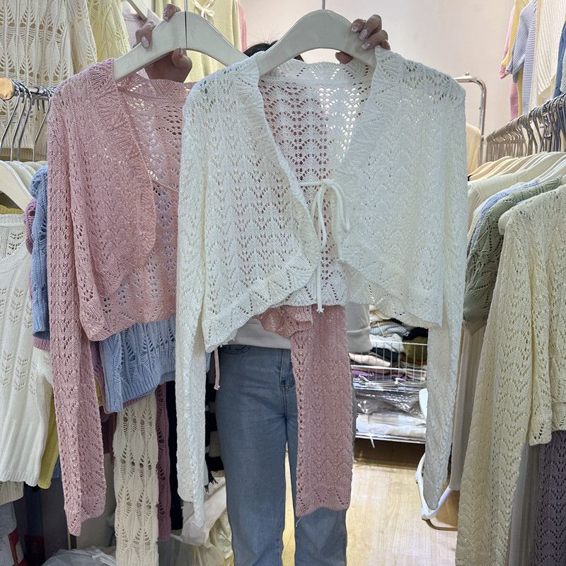 Korean version of the wooden ear side short strap knitted cardigan women's 2023 spring commuting gentle and sweet hollow outerwear jacket