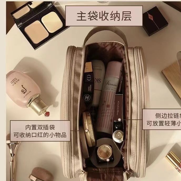 化妝包女大容量便攜旅行2023新款高級感化妝刷洗漱品收納袋超火