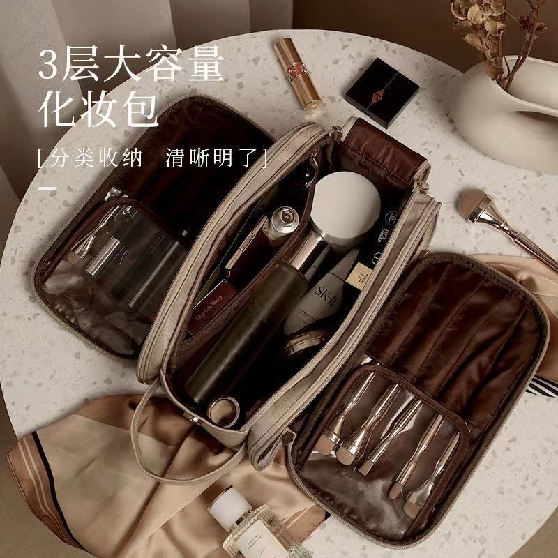 化妝包女大容量便攜旅行2023新款高級感化妝刷洗漱品收納袋女士