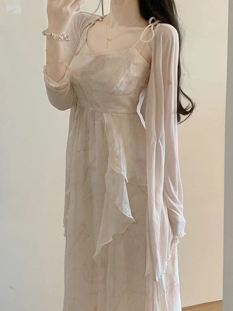 French high-end floral suspender dress women's summer new gentle style temperament super fairy forest mid-length skirt