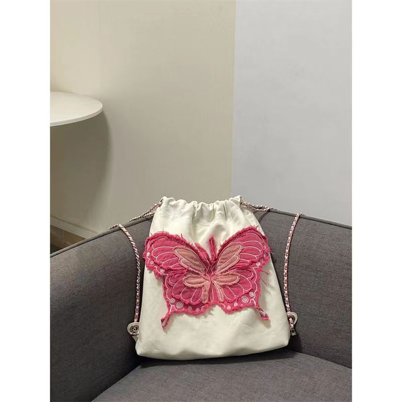 Niche retro butterfly backpack women's large capacity wild tassel canvas bag embroidery commuting leisure...