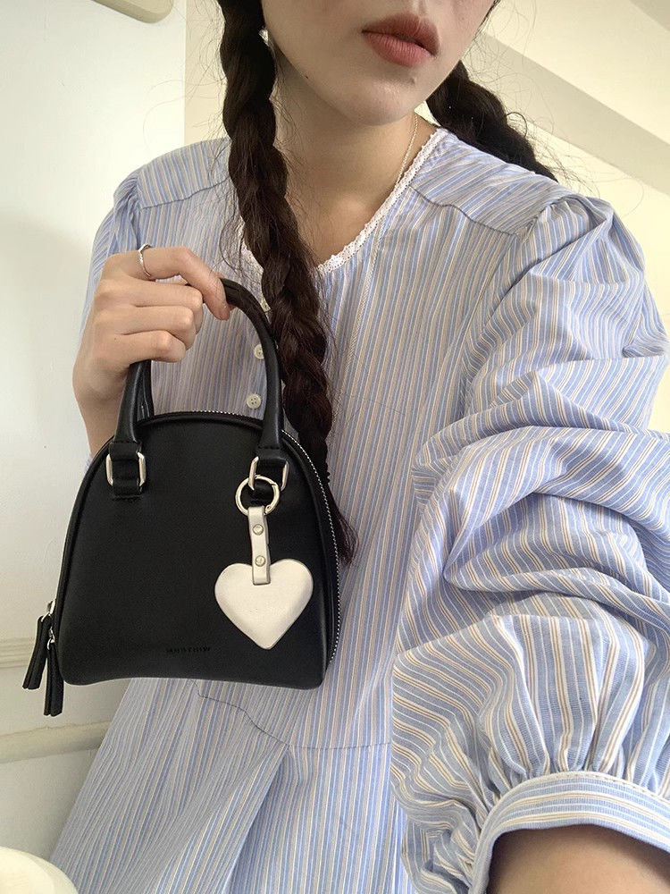 肉肉陈Whiterm韩国小众设计女包新款可爱手提贝壳包单肩斜跨小包