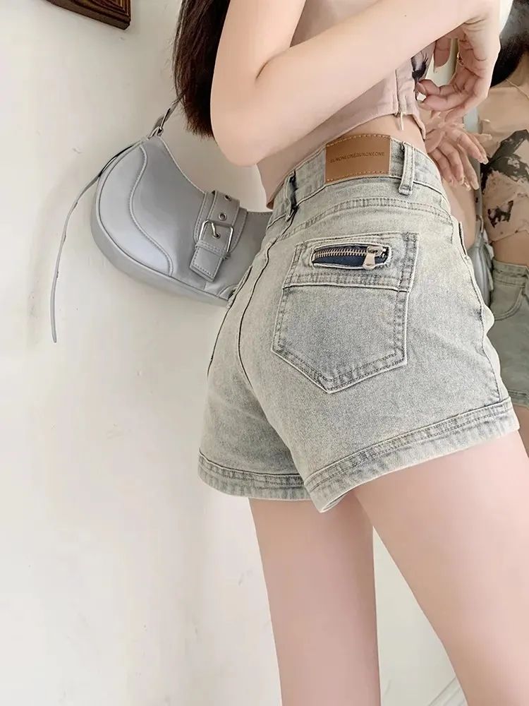 辣妹美式復古牛仔短褲女2023夏季新款高腰顯瘦設計感A字超短熱褲