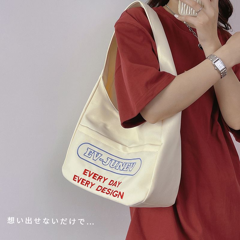 學生上課包包女大容量帆布包學院風百搭字母印花單肩學生托特包潮