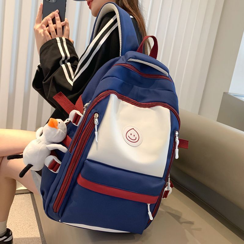 Schoolbag female ins style Korean version high school junior high school student large capacity backpack simple middle school student burden reducing casual backpack