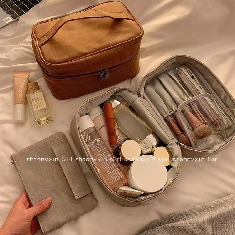 化妝包女大容量旅行手提便攜防水化妝品護膚品化妝刷收納包洗漱包