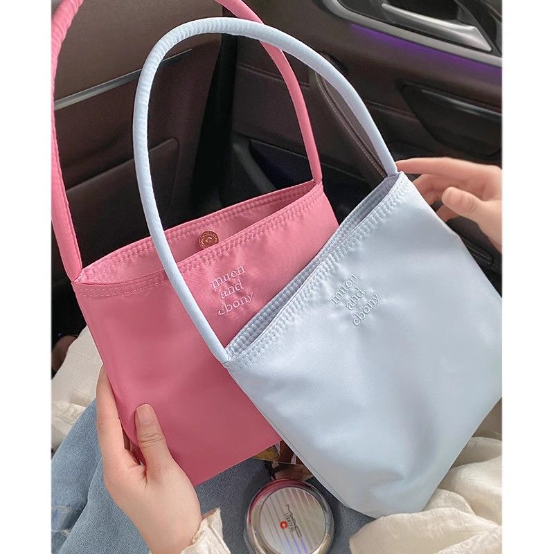 韓國手提尼龍布包包女2023新款潮時尚刺繡腋下包百搭單肩水桶包