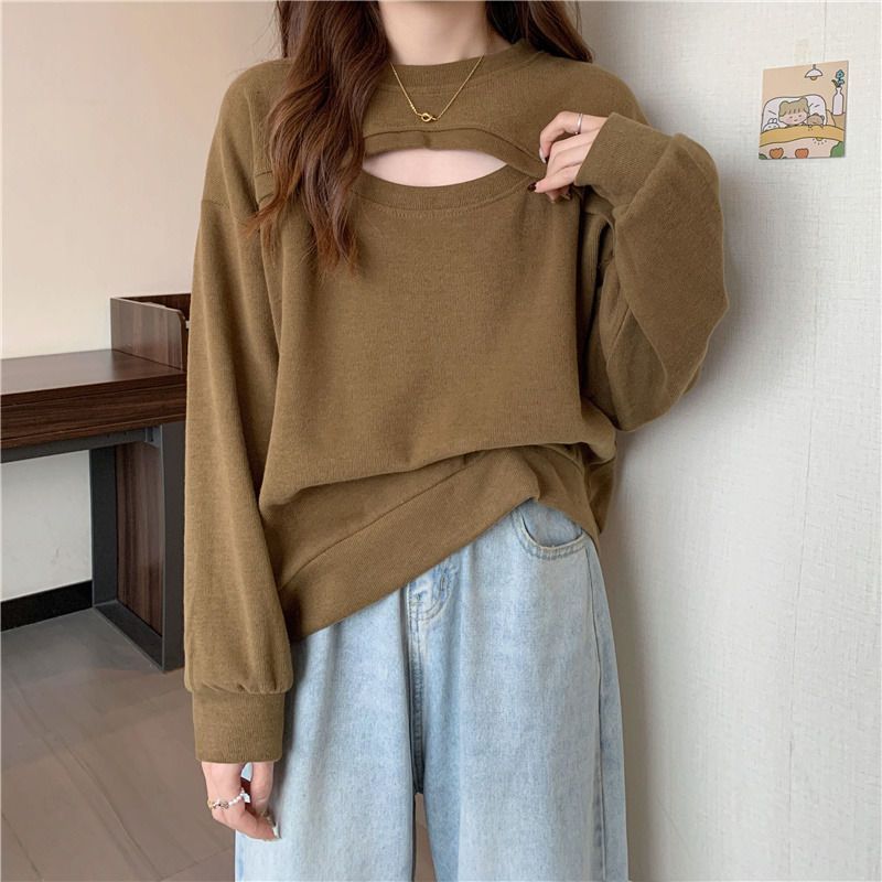 Hollow sweet and spicy sweater women's advanced loose large size slightly fat mm spring and autumn thin section splicing long-sleeved top women's models