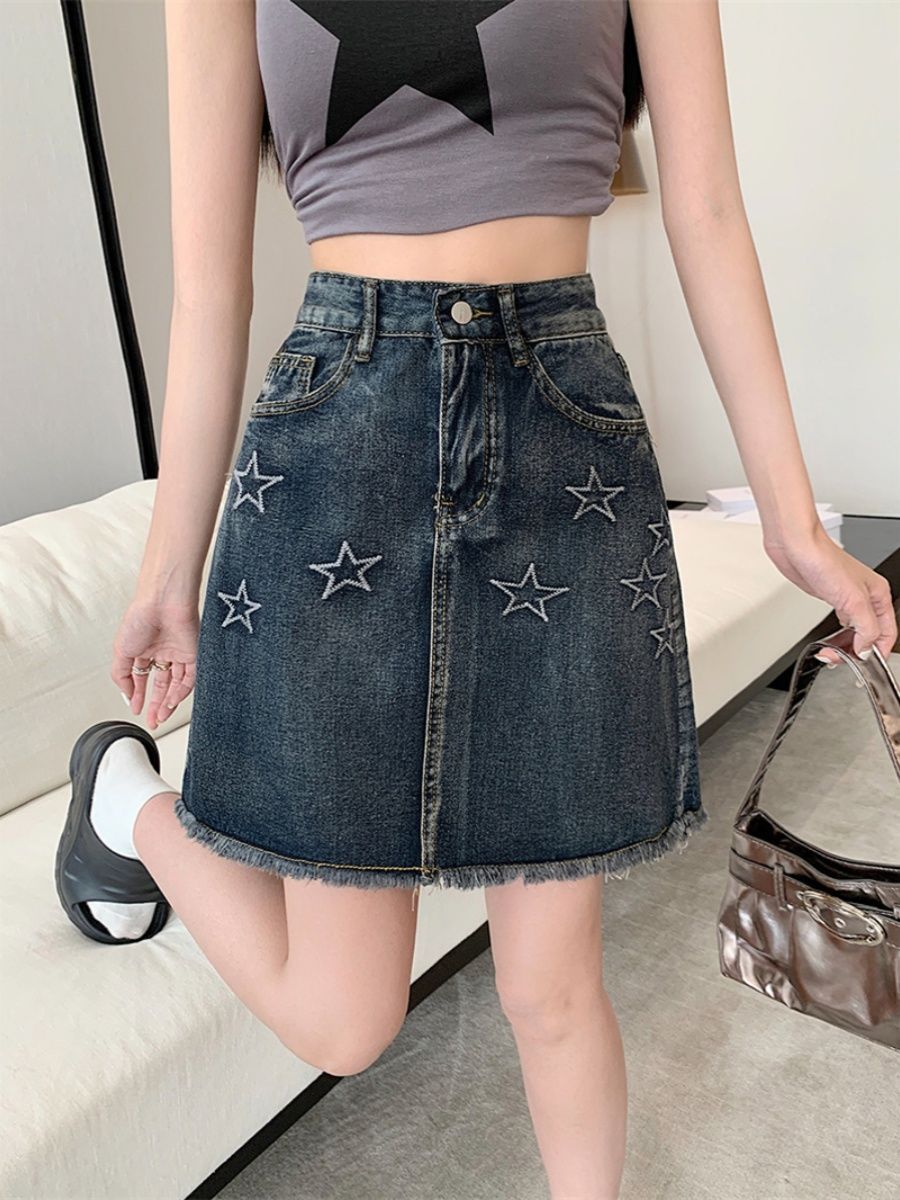 美式復古星星刺繡牛仔半身裙女大碼設計感辣妹A字包臀毛邊短裙子