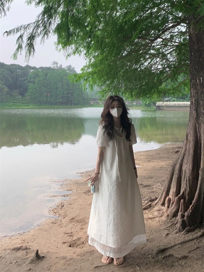 Summer 2023 new style chic lace splicing long skirt French resort style hollow waist short-sleeved dress for women