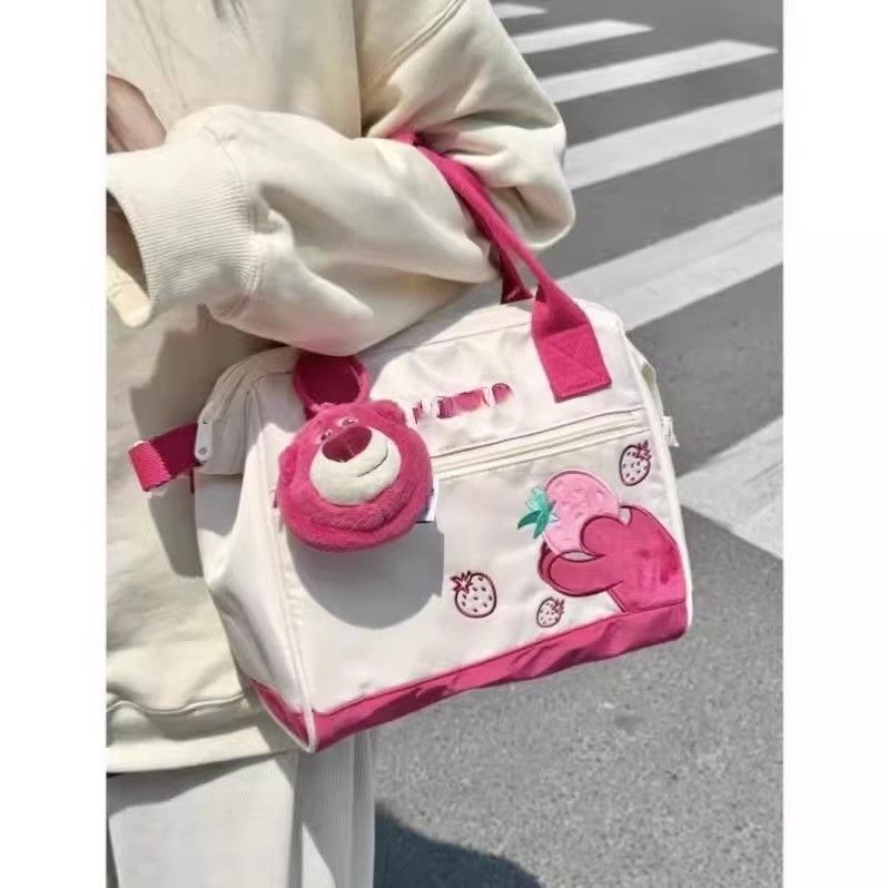 草莓熊手提斜挎包女2024新款大容量包包可愛卡通單肩包