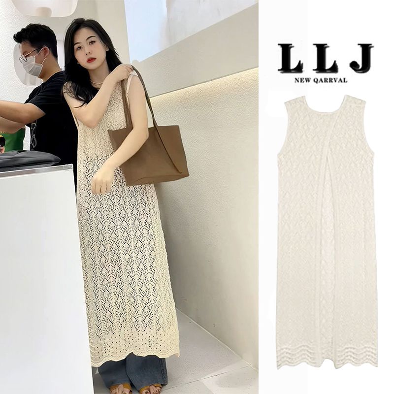 Hollow sweater knitted sweater long sunscreen blouse women's summer new foreign style age-reducing thin section with slit long skirt