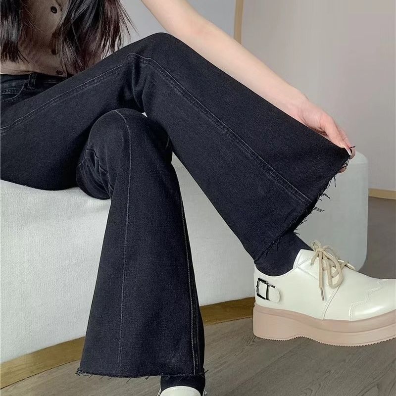 黑色梨型身材毛邊微喇牛仔褲女夏秋2023新款高腰顯瘦設計感馬蹄褲