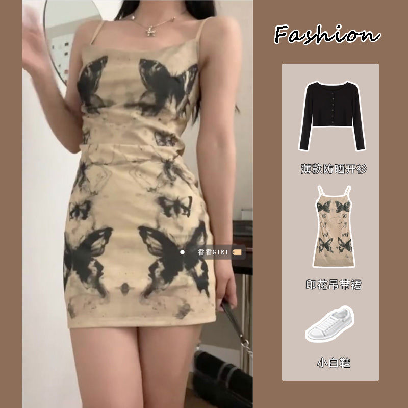 純欲風收腰印花吊帶連衣裙套裝女夏季薄款防曬開衫辣妹修身包臀裙