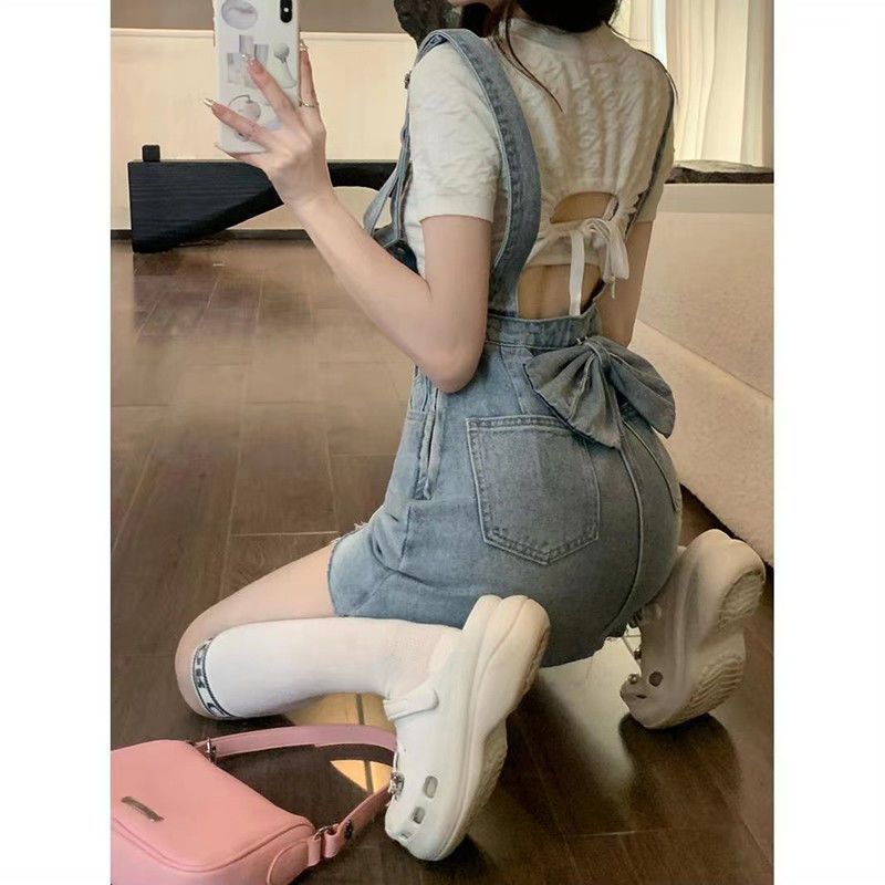 藍色牛仔背帶裙連衣裙女夏季法式氣質設計感小眾後背蝴蝶結短裙子
