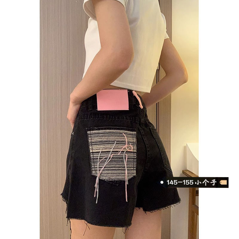 Black tassel raw edge pocket denim shorts for women summer new loose slimming design A-line wide-leg hot pants