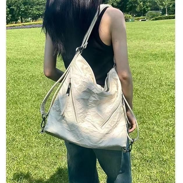 韓系田園2023新款寬肩帶褶皺通勤雙肩包女高級感單肩斜挎包
