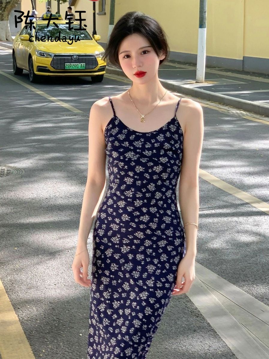 陳大鈺法式茶歇仙女森系海邊度假吊帶連衣裙新款小雛菊碎花裙子女