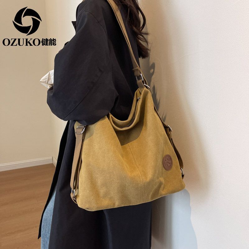 健能2023大容量純色簡約學生上課單肩包休閒雙肩帆布包斜挎托特包
