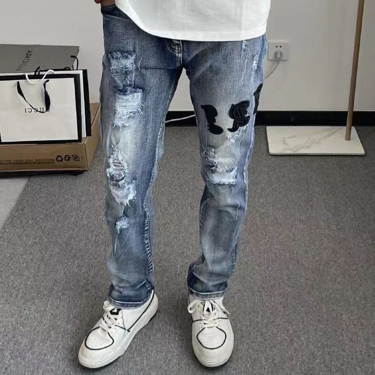 美式潮牌高街精神小伙小腳長褲蘇6同款繡花拼皮梵文破洞牛仔褲男