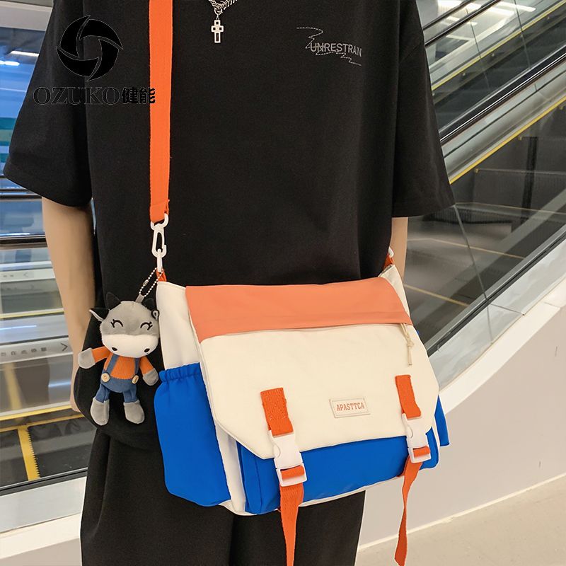 Jian Neng Japanese trendy brand contrasting color male and female college students large-capacity nylon shoulder bag cross-body book bag