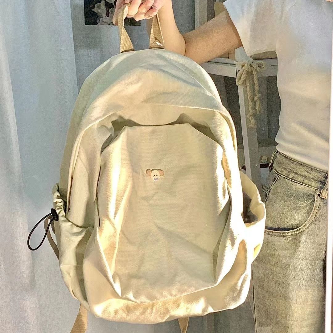 Schoolbag female high school student lightweight travel Japanese simple ins casual backpack pleated large capacity backpack