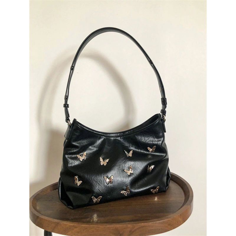 Niche textured armpit bag for women 2023 new trendy and cool bow tote bag, versatile one-shoulder portable armpit bag