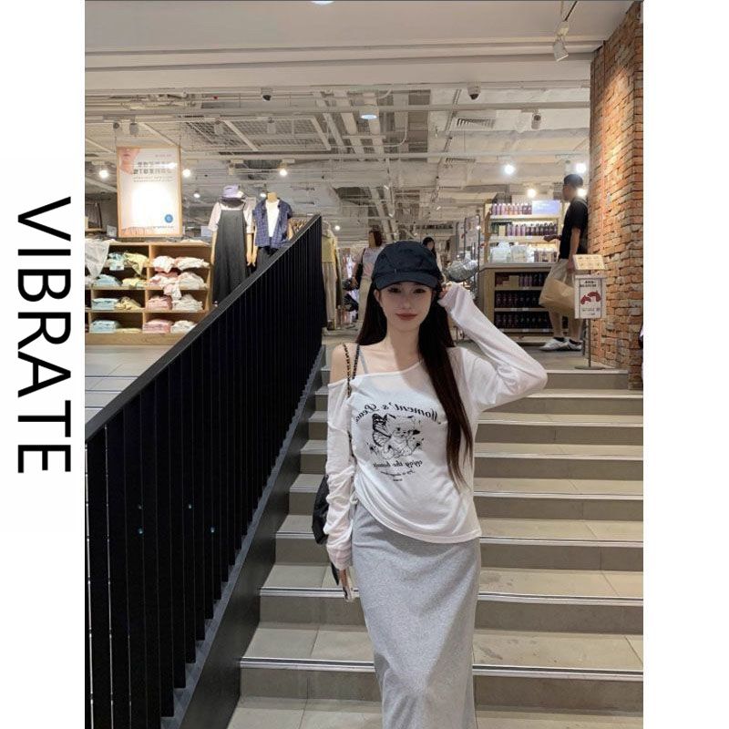 VIBRATE长袖薄款甜辣抽绳T恤女白色不规则卡通印花韩系时髦上衣潮