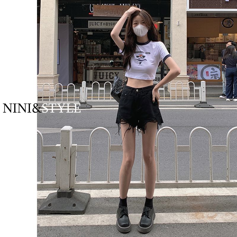 Black raw edge a-line hot pants ripped denim shorts for women summer 2023 new high waist hotties slimming wide legs