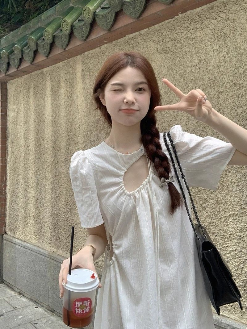 Summer 2023 new style holiday style hollow drawstring design high-end French long skirt white dress for women