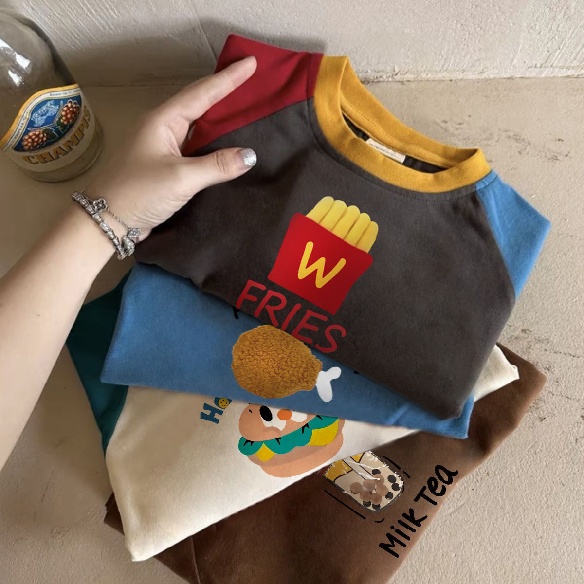 Children's long-sleeved T-shirt 2023 new autumn style for boys and girls Korean version of cartoon letters color-blocking raglan sleeve bottoming shirt round neck T