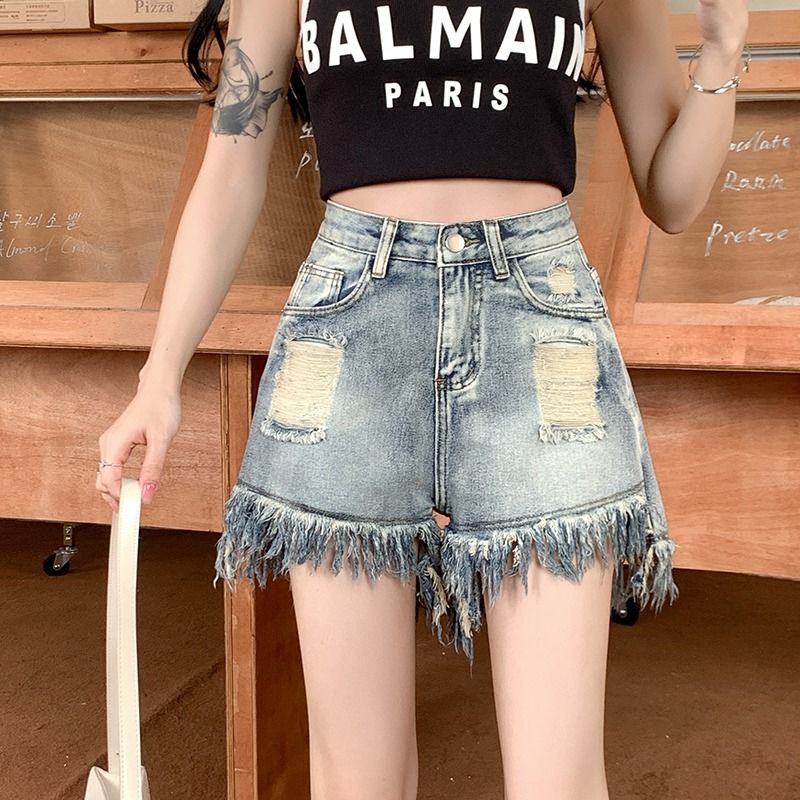 美式復古破洞牛仔短褲女夏季高腰設計感小眾流蘇寬鬆a字闊腿熱褲