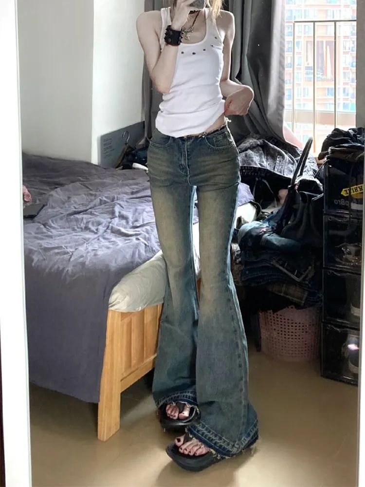 復古毛邊微喇叭牛仔褲女秋季新款辣妹低腰顯瘦闊腿拖地馬蹄褲子潮