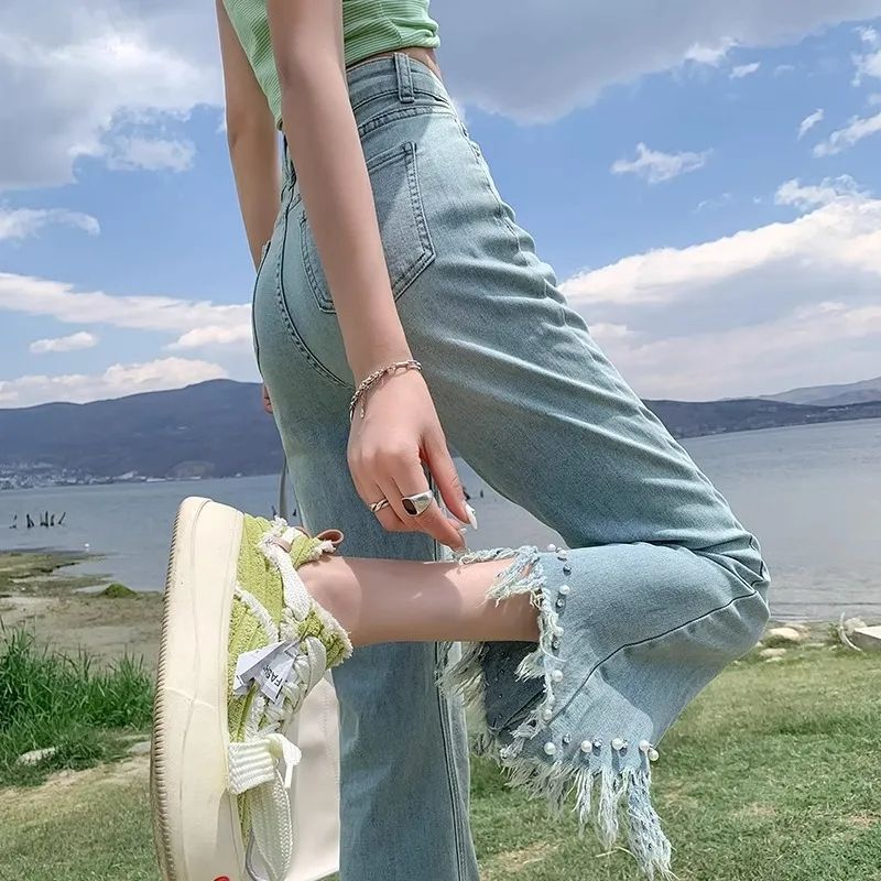 微喇牛仔褲女小個子春秋新款流蘇毛邊釘珠設計感高腰顯瘦九分褲子