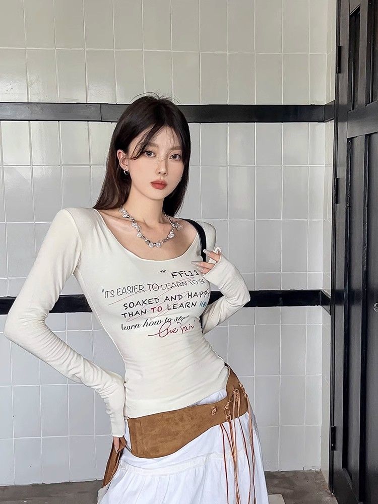 小眾塗鴉印花圓領長袖T恤女秋季新款修身顯瘦百搭短款打底衫上衣