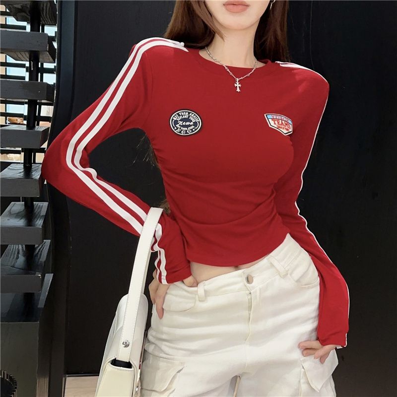 American hot girl long-sleeved waist-revealing T-shirt for women in autumn, slimming and sexy top, fashionable and age-reducing shirt trend
