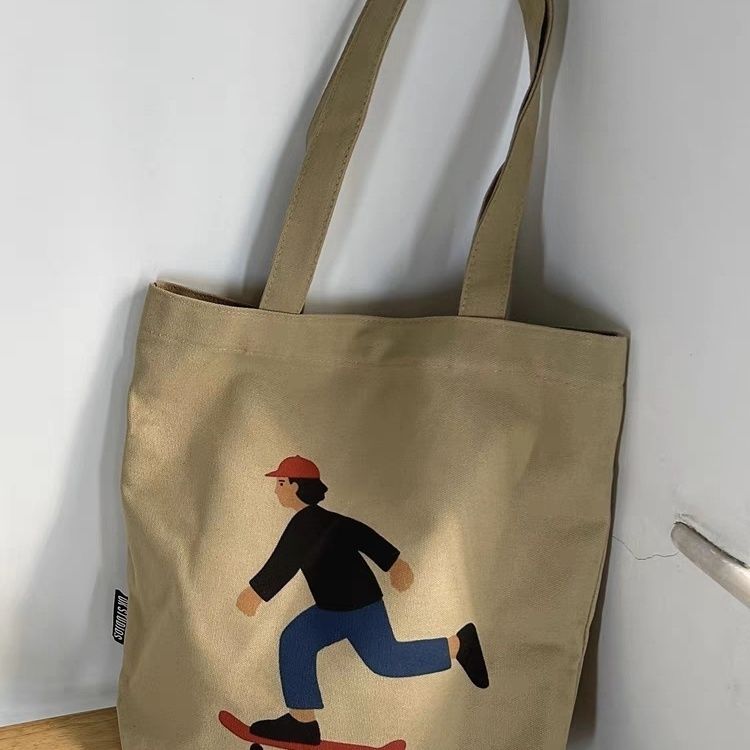 2023 New Khaki Skateboard Style Shoulder Canvas Bag Women’s Lazy Style Literary Tote Bag Men’s Korean Backpack