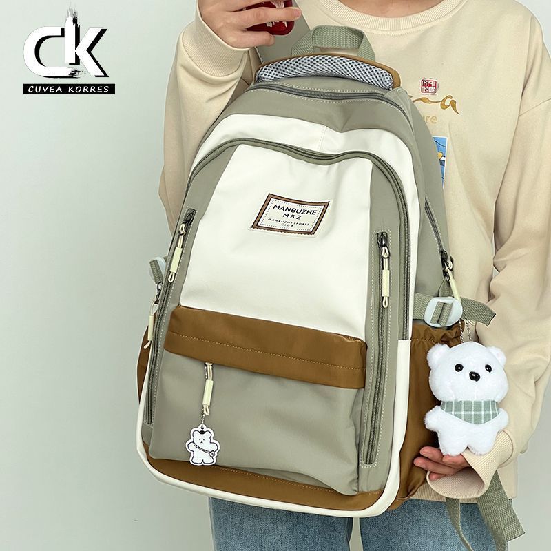 Schoolbags for girls, middle and high school students, large-capacity and durable backpacks, burden-reducing and spine-protecting, forest-style, versatile primary school student backpacks