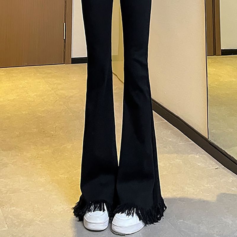 設計感牛仔褲辣妹秋冬新款高腰修身毛邊喇叭褲流蘇黑色闊腿馬蹄褲