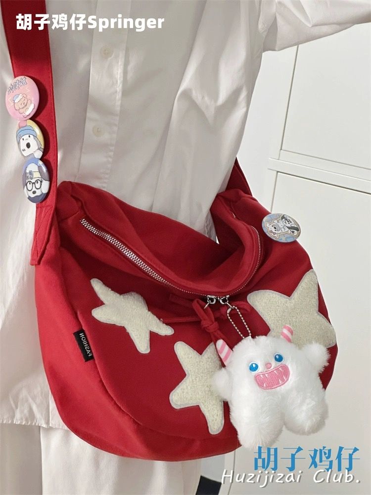 簡約百搭休閒少女星星包包女復古大容量斜挎包可愛餃子包潮單肩包