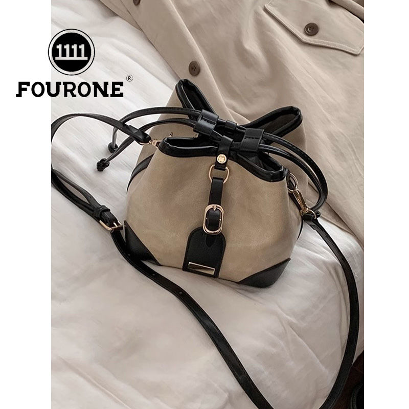 Versatile contrasting color crossbody bag for women 2023 new fashion Korean bucket bag niche texture shoulder bag