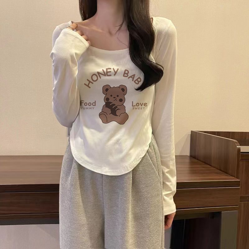 純欲風不規則大方領長袖t恤女白色早秋新款韓版修身弧形下擺上衣