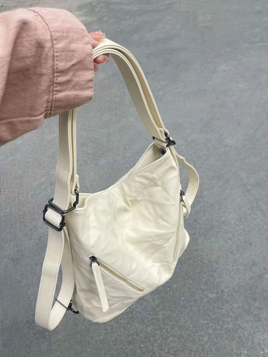 Korean pastoral 2023 new wide shoulder strap pleated commuter backpack women's high-end single shoulder crossbody bag
