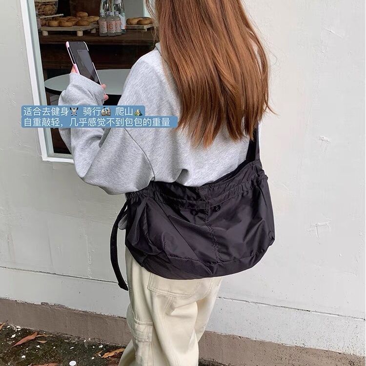 餃子包女斜跨腋下包2023新款大容量休閒運動風單肩托特包潮