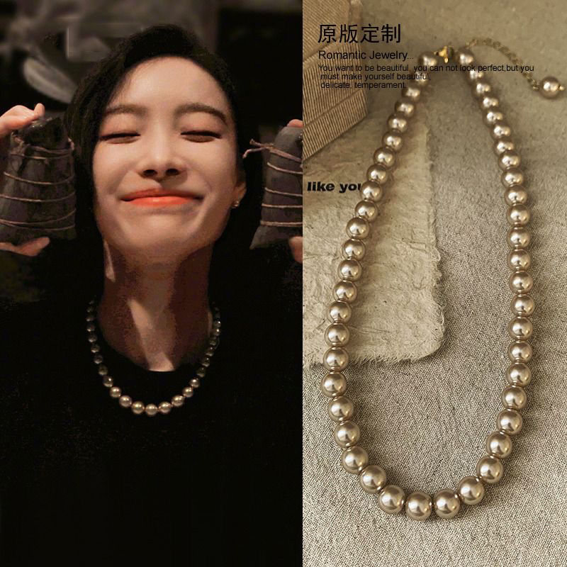 Ni Ni's same champagne color pearl necklace women's niche design light luxury high-end necklace new style temperament sweater chain