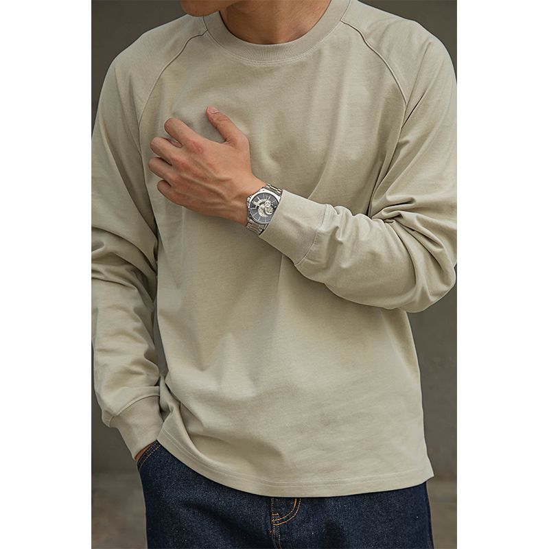 Amerikansk raglan långärmad T-shirt i ren bomull för män Amikaki liten halsringning med en trendig logotyp under_voghion.com
