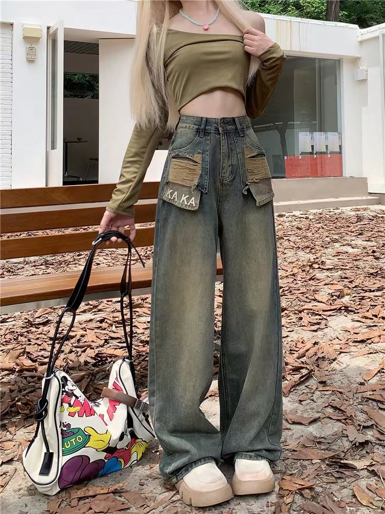 美式復古設計感刺繡破洞牛仔褲女春秋不規則高腰顯瘦闊腿拖地褲潮