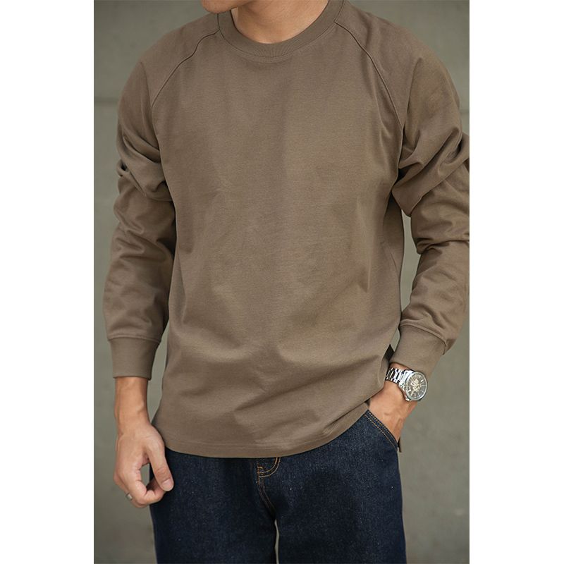 Amerikansk raglan långärmad T-shirt i ren bomull för män Amikaki liten halsringning med en trendig logotyp under_voghion.com