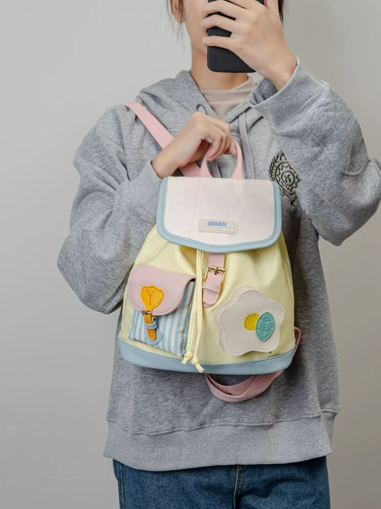 迷你双肩包包女2023新款小众设计大学生可爱撞色小书包通勤小背包