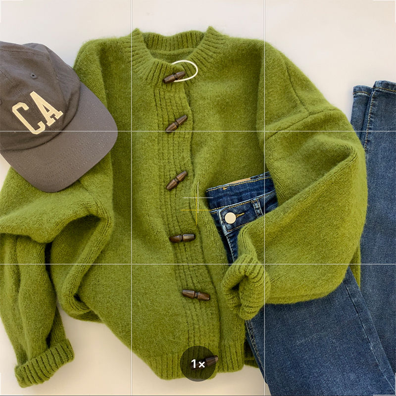 Design niche green horn button knitted cardigan for women to wear as an outer sweater jacket in autumn with high-end temperament